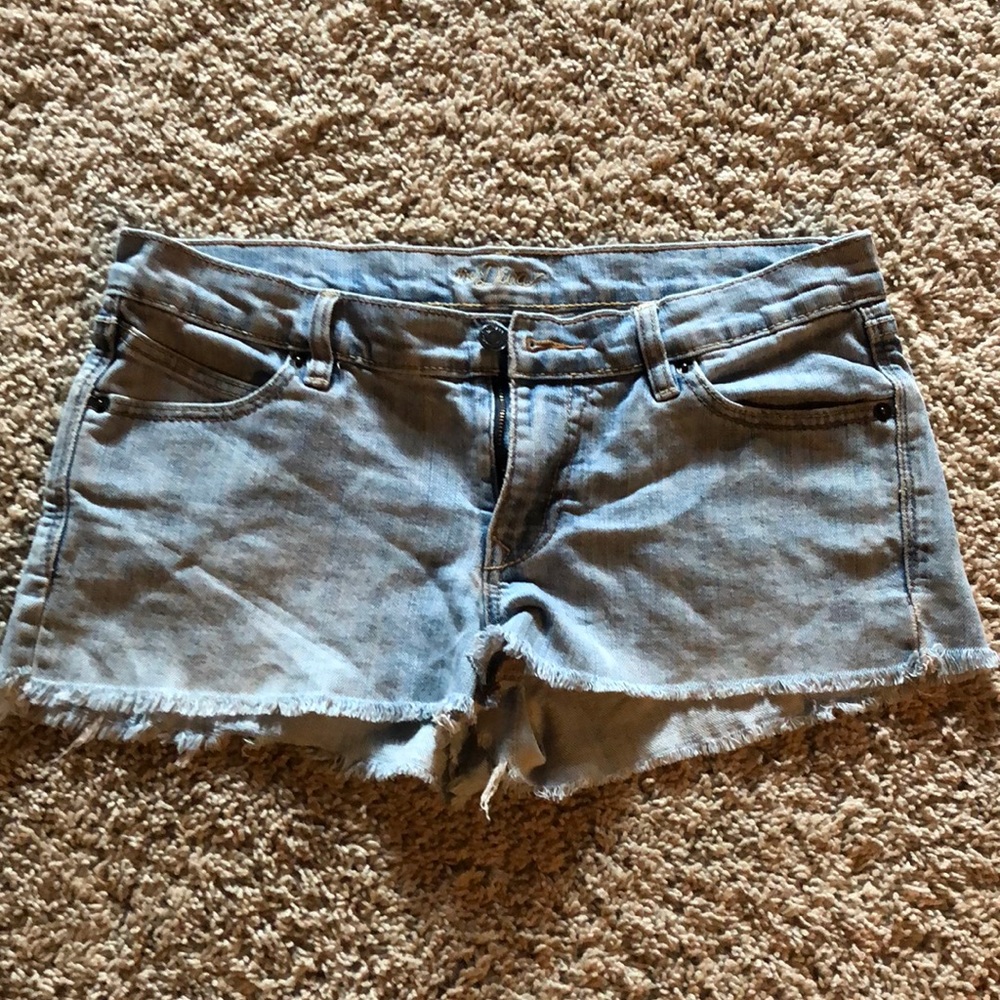 Washed-out blue jean shorts